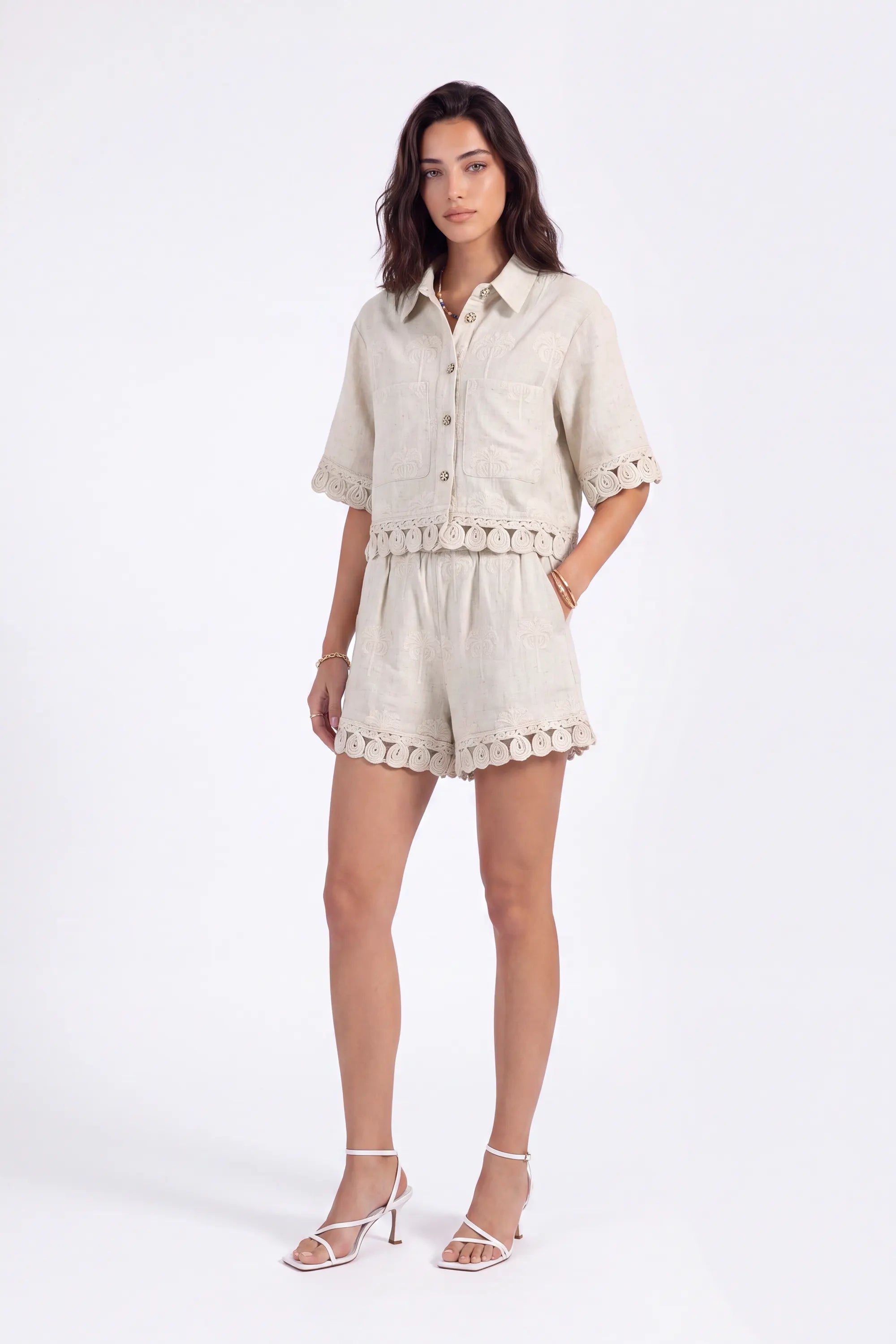 Beige Embroidered Shorts with Loop-Trim Hem on model, studio view 2 – Elppis 2J5G01499JJ