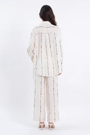 Cream Polyester Wide-Leg Pants with Black Dot Stripes on model, back view – Elppis 3B5I07511WW