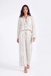 Cream Polyester Wide-Leg Pants with Black Dot Stripes on model, front view – Elppis 3B5I07511WW
