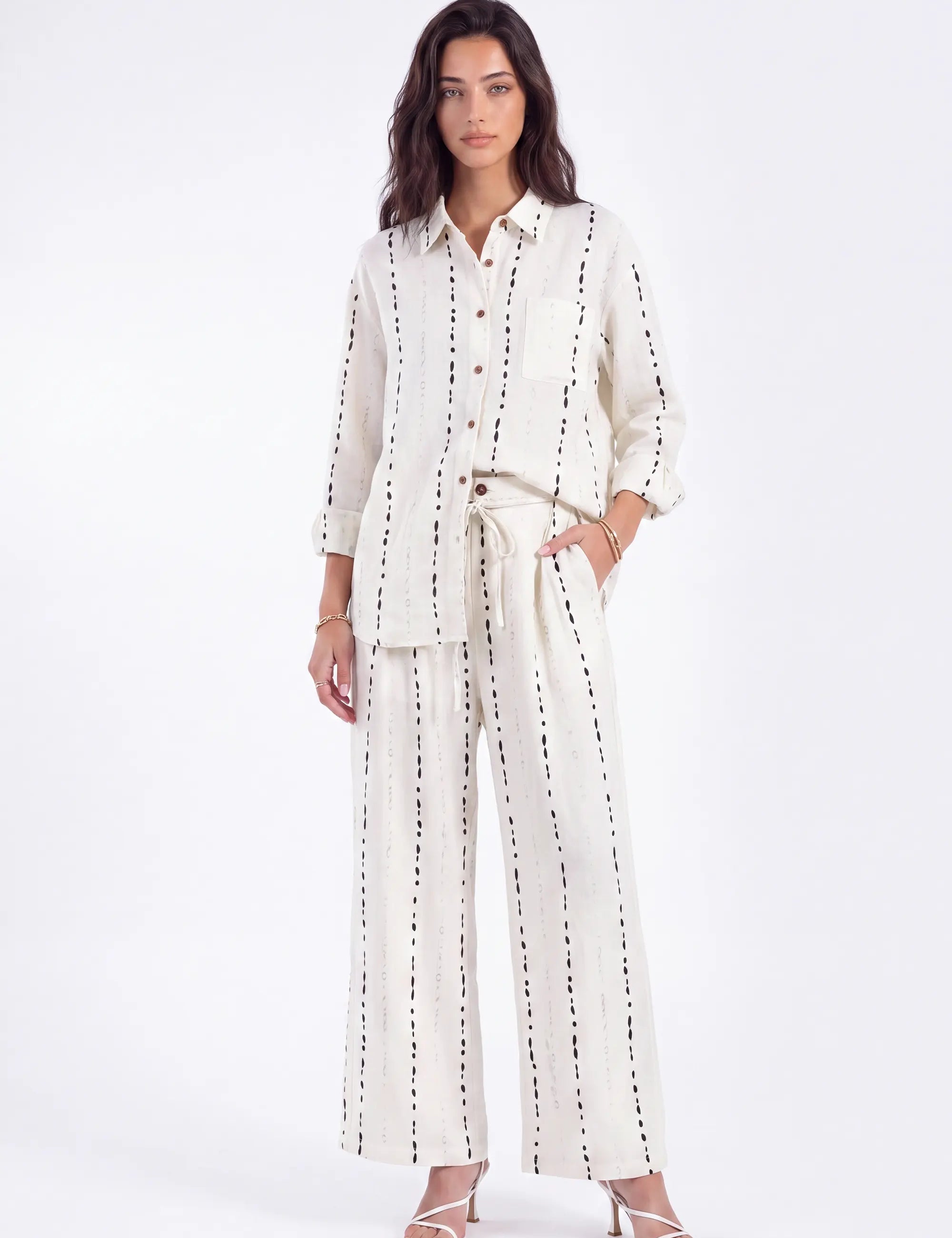 Cream Polyester Wide-Leg Pants with Black Dot Stripes on model, studio view 2 – Elppis 3B5I07511WW