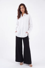 White Oversized Shirt with Free Me Hummingbird and Flamingo Tropical Embroidery on model, front view – Elppis 3J5F01718BT