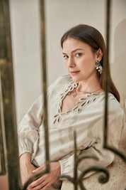 Elppis Beige Linen Long-Sleeve Blouse with Cutwork Embroidery, editorial styling view on model — SKU 2B5F07019WW