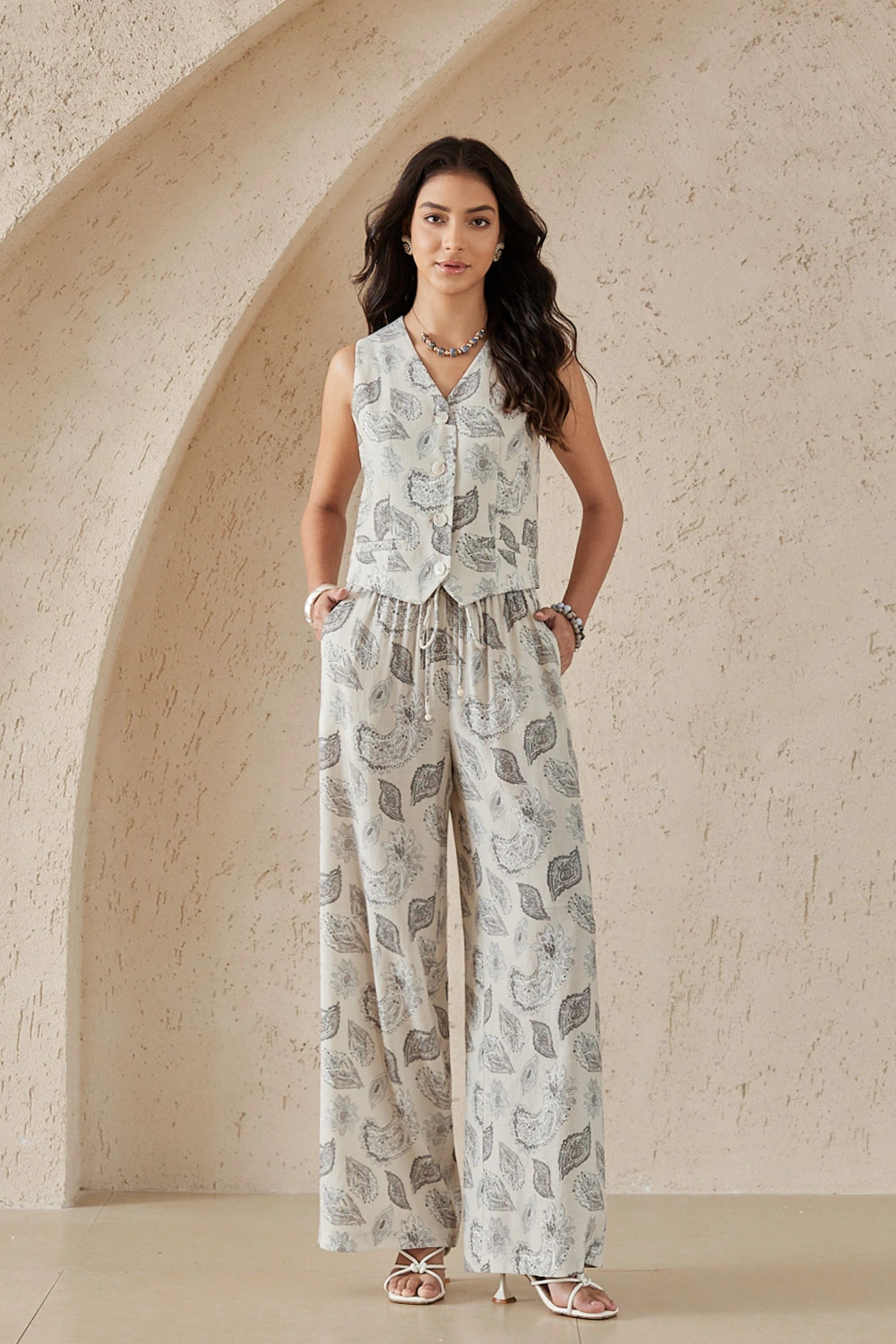 Elppis Beige Paisley Print Button-Front Sleeveless Vest, editorial styling view on model — SKU 1J6D12455BR