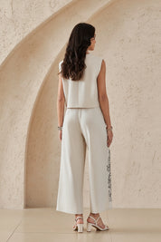 Elppis Beige Viscose-Linen Blend Floral Embroidery Wide-Leg Pants, editorial styling view on model — SKU UV4I6029BK