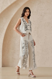 Elppis Beige Viscose-Linen Blend Floral Embroidery Wide-Leg Pants, editorial styling view on model — SKU UV4I6029BK