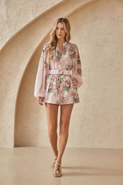 Front model view of the Elppis blush pink rose print chiffon blouse