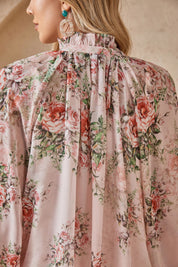 Close-up of the floral back yoke and gathered chiffon detail