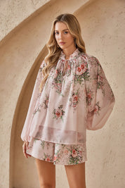 Side view of the Elppis romantic rose print chiffon blouse