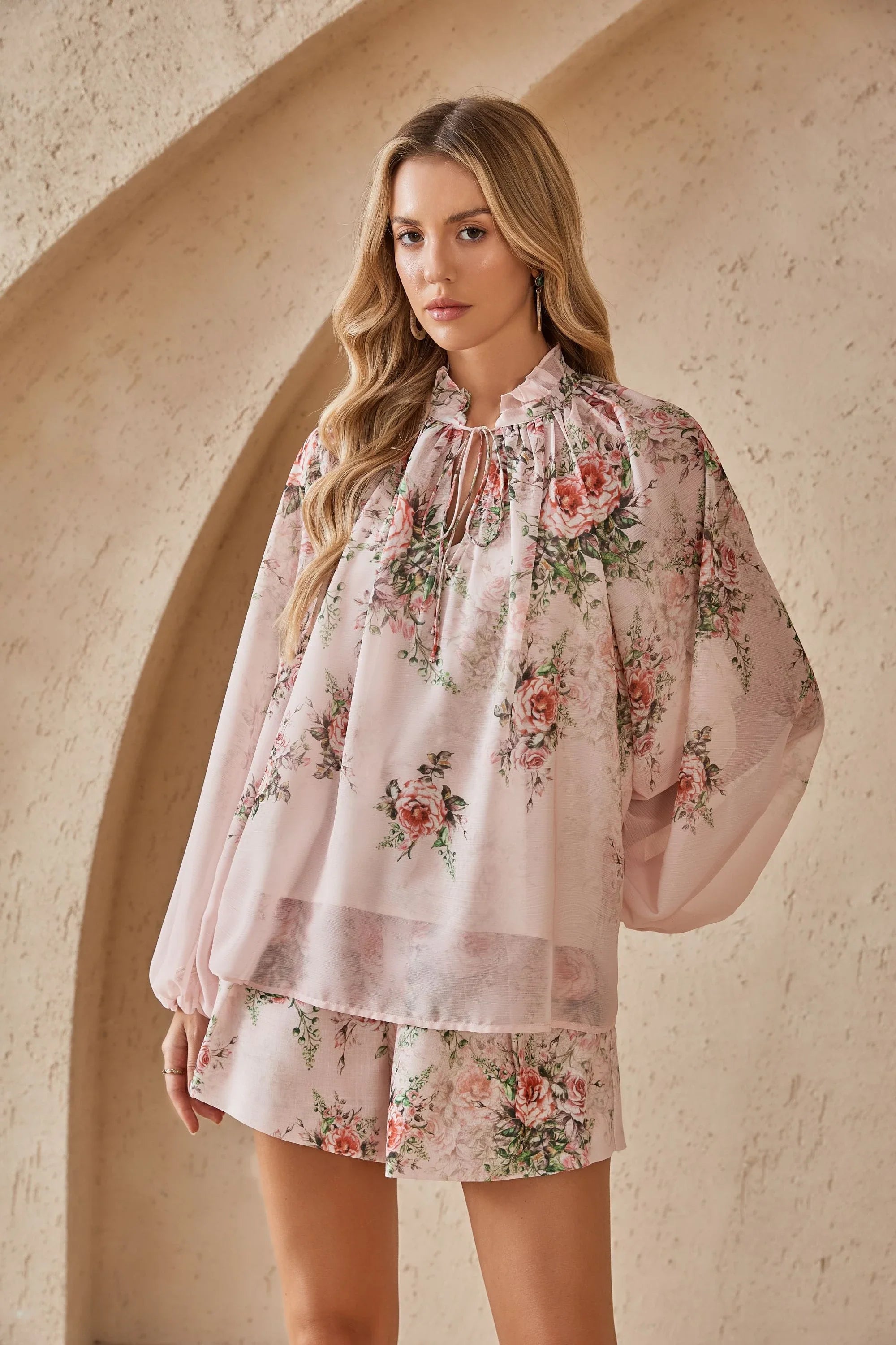 Side view of the Elppis romantic rose print chiffon blouse