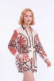 Cream High-Waisted Shorts with Red and Black Geometric Print and Buckle Belt — model front view 3
