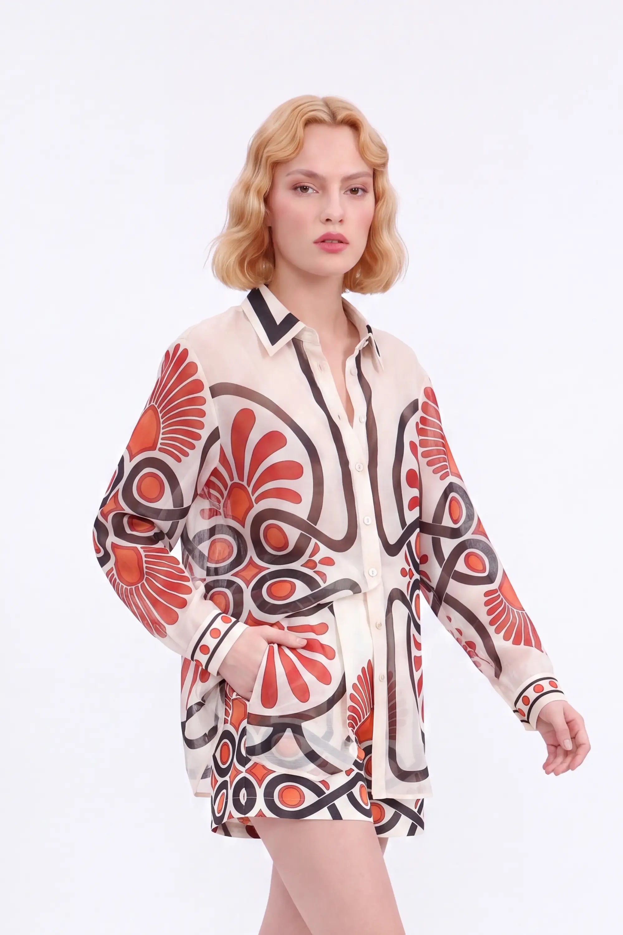 Cream High-Waisted Shorts with Red and Black Geometric Print and Buckle Belt — model front view 3