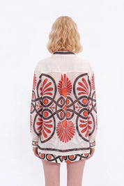 Cream High-Waisted Shorts with Red and Black Geometric Print and Buckle Belt — model front view 4