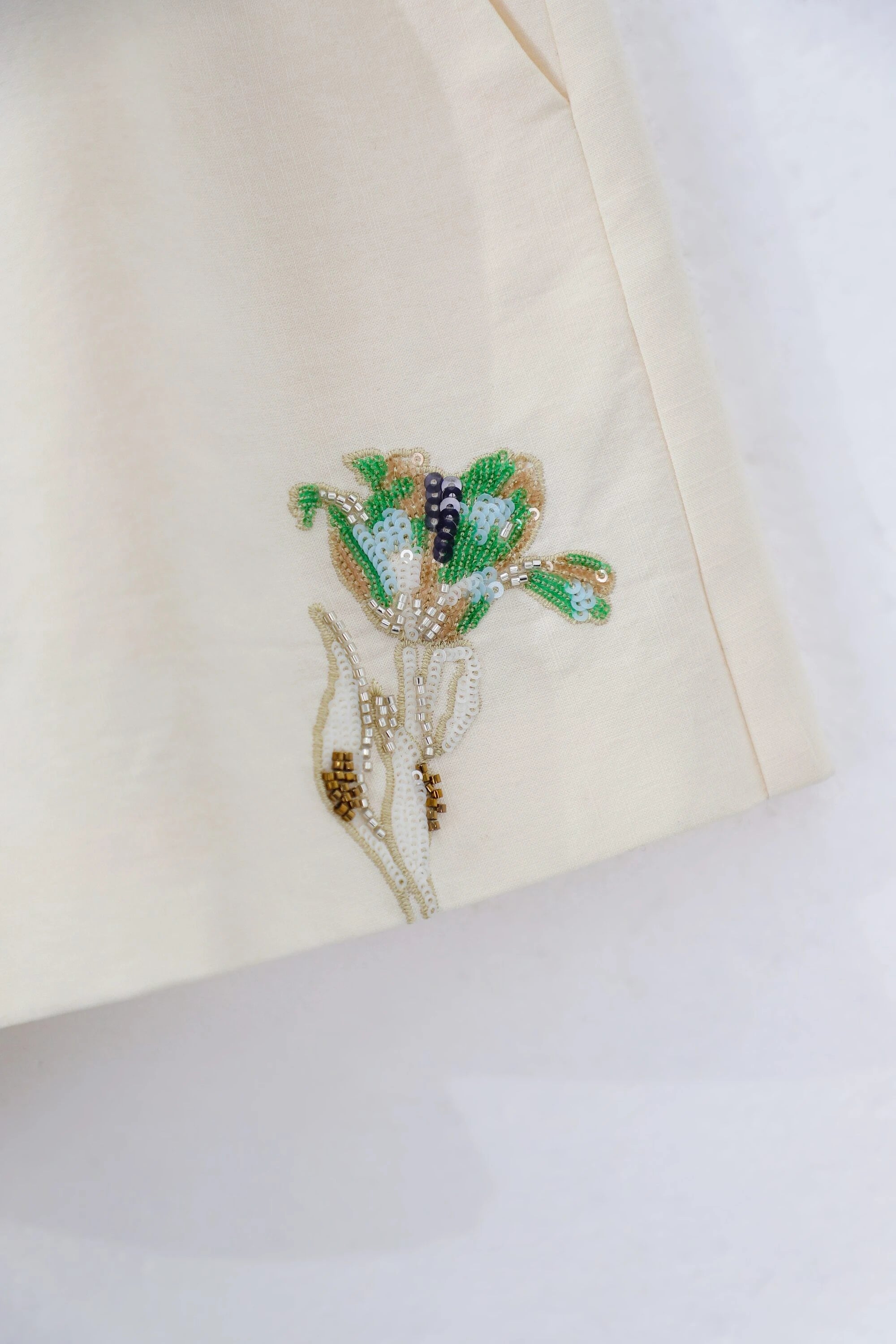 Elppis Cream Satin-Blend Vest with Colorful Tulip Sequin Embroidery, product detail view — SKU 1J6R10823BN