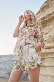 Lifestyle view of Elppis floral eyelet lace shorts with scalloped trim