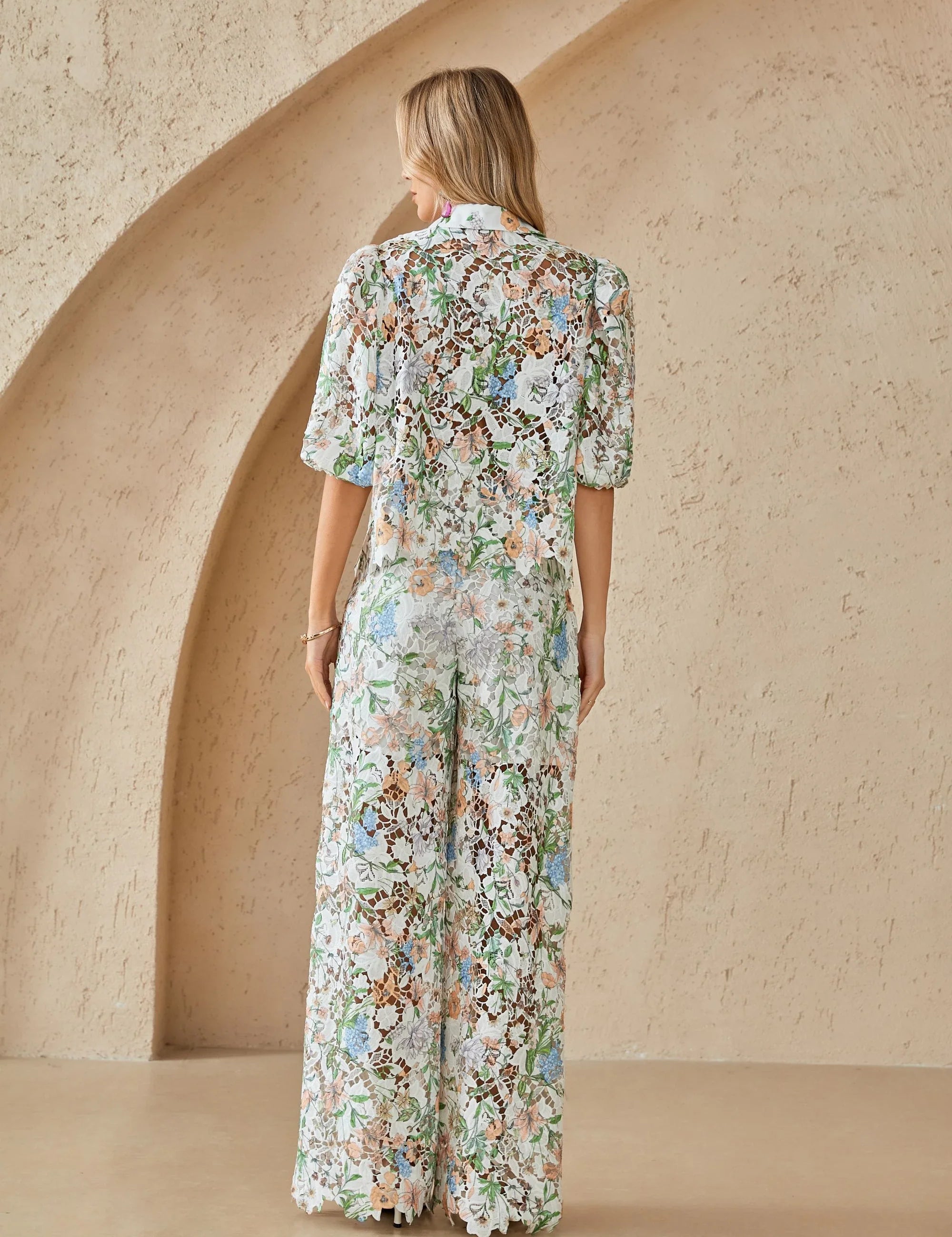 Back model view of Elppis floral lace wide-leg pants