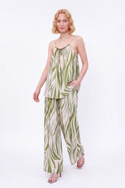 Elppis Green Abstract Stripe Beaded Halter Camisole modeled on a white background, full-length front view