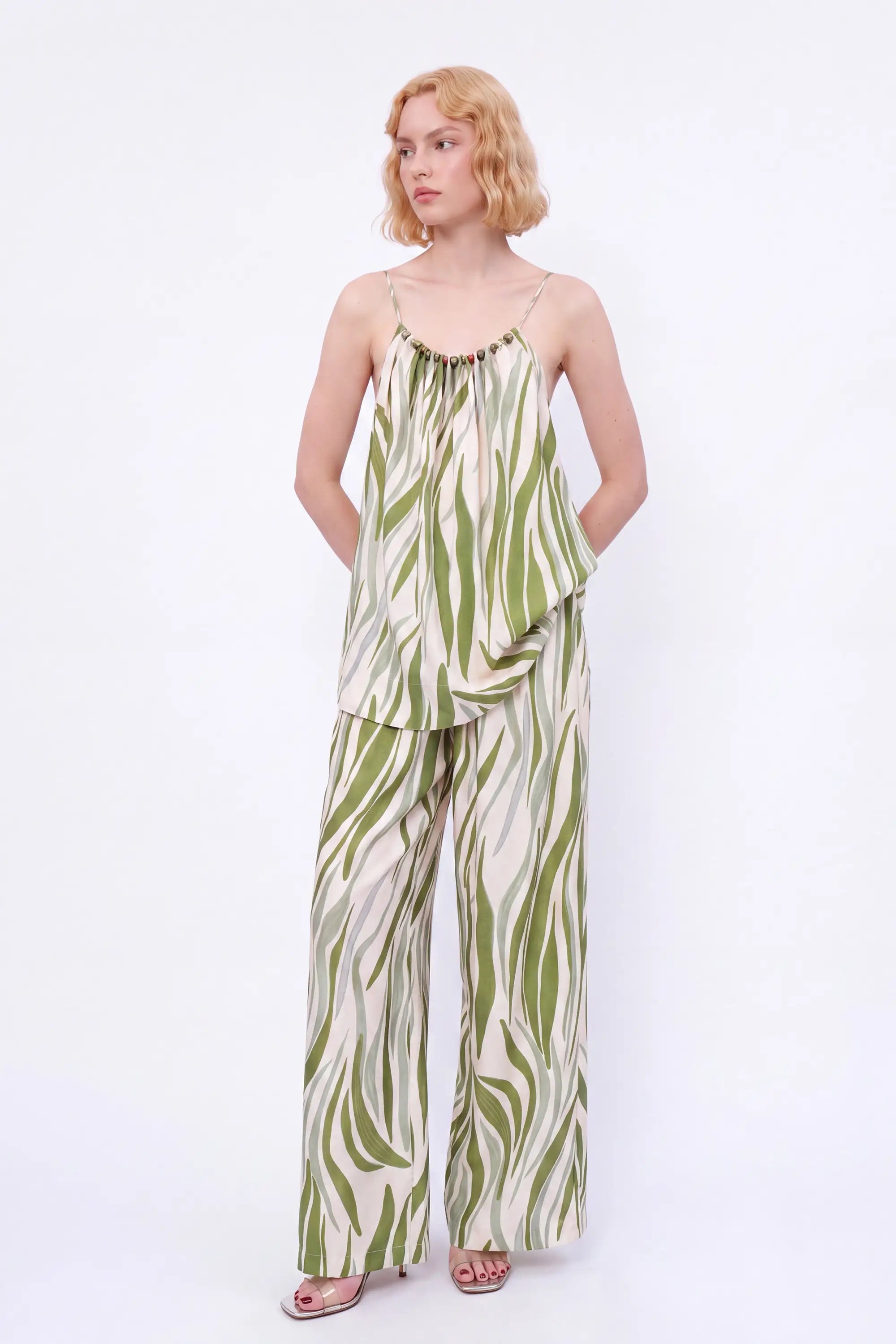 Elppis Green Abstract Stripe Beaded Wide-Leg Pants modeled on a white background, relaxed front view