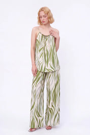 Elppis Green Abstract Stripe Beaded Wide-Leg Pants modeled on a white background, angled front view