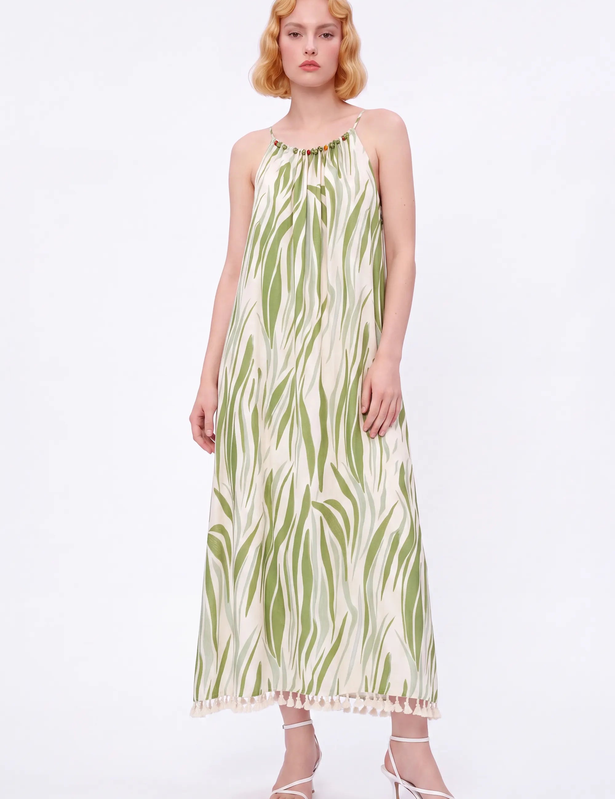 Green Leaf Print Halter Maxi Dress with Pom-Pom Hem — Model White Background Front