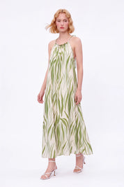 Green Leaf Print Halter Maxi Dress with Pom-Pom Hem — Model White Background View 3