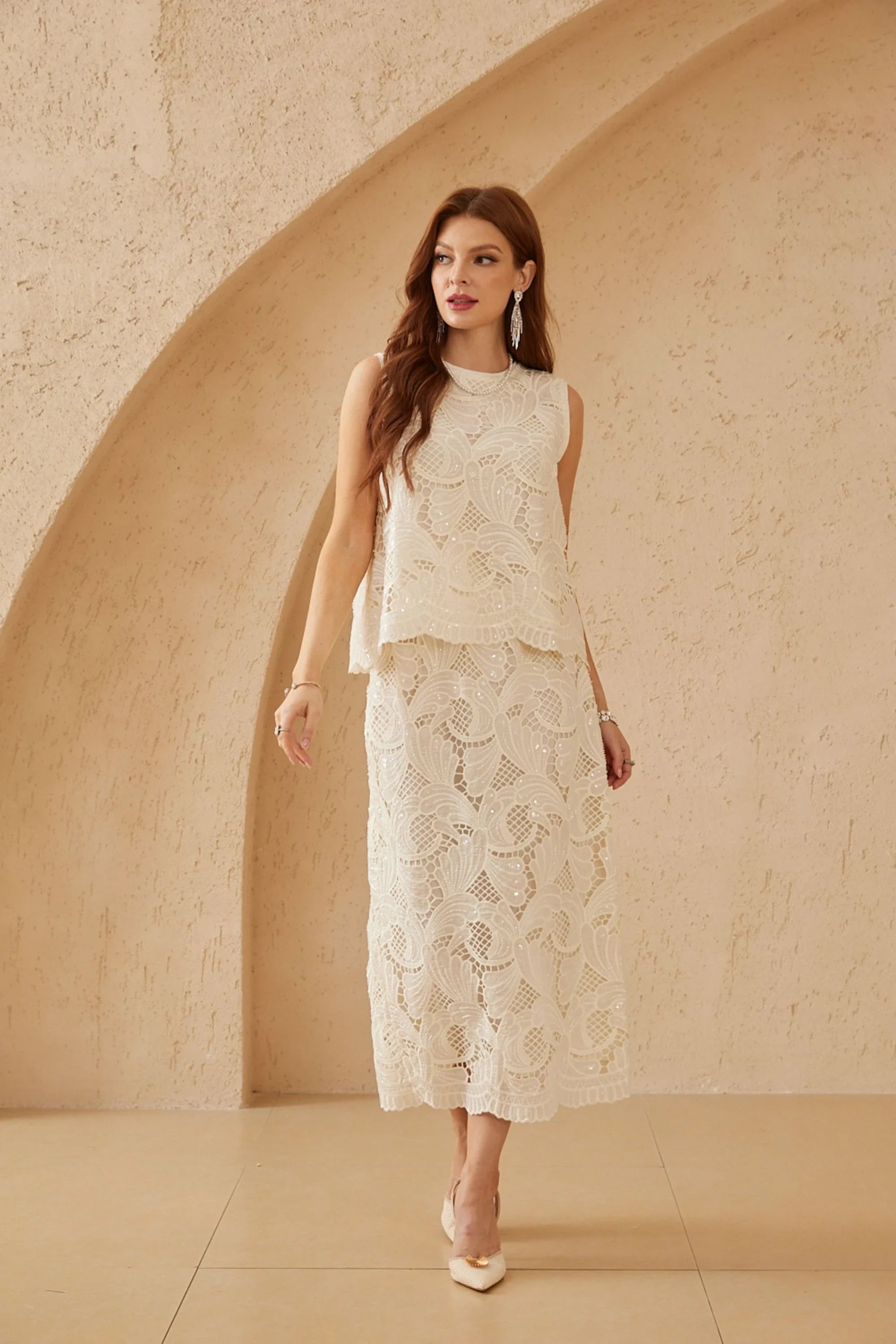 Front studio view of the Elppis ivory floral lace top and midi skirt set