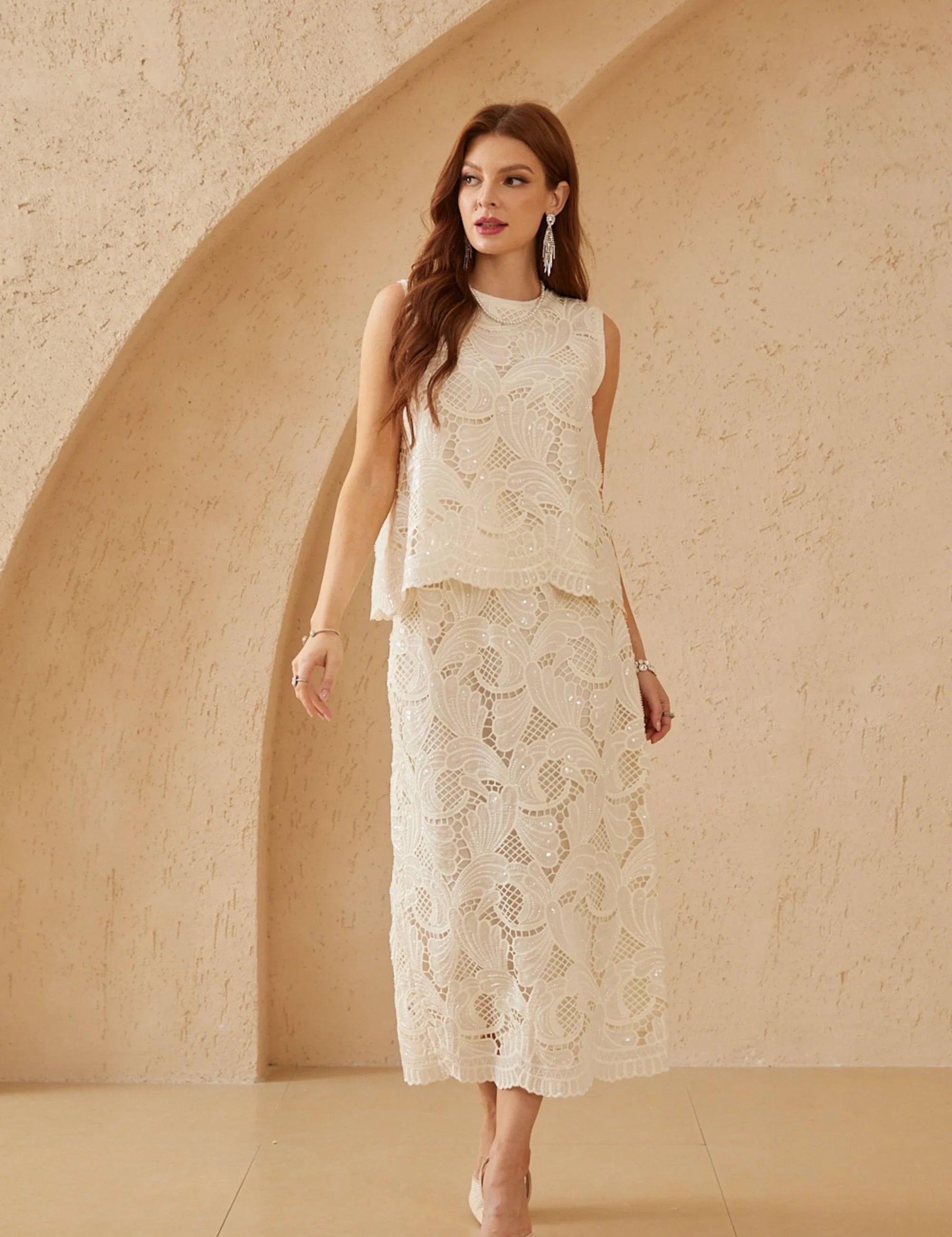 Front studio view of the Elppis ivory floral lace top and midi skirt set