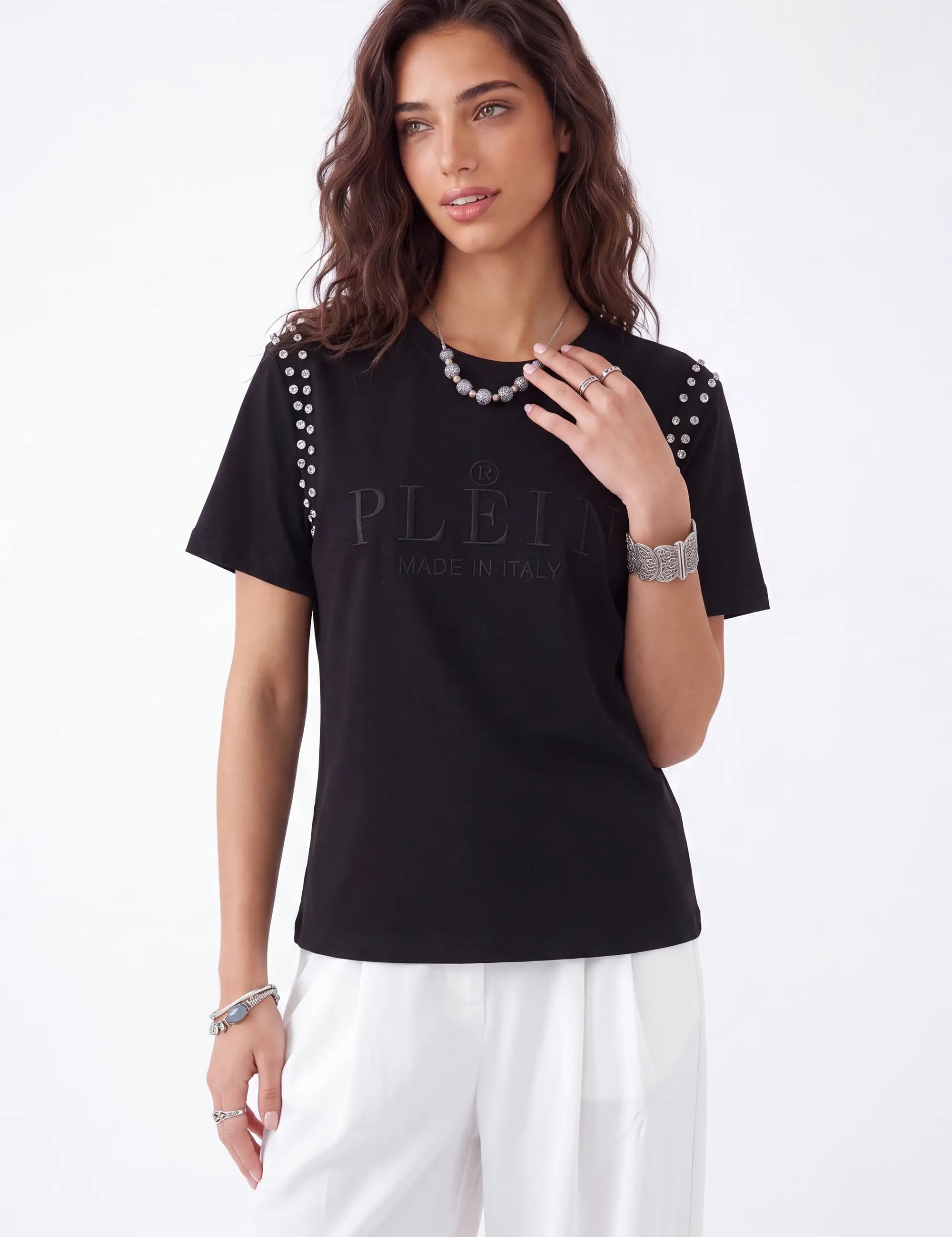 Black Crew Neck T-Shirt with Studded Shoulders and PLEIN Embroidery on model, studio view 2 – Elppis JD3E5410AV