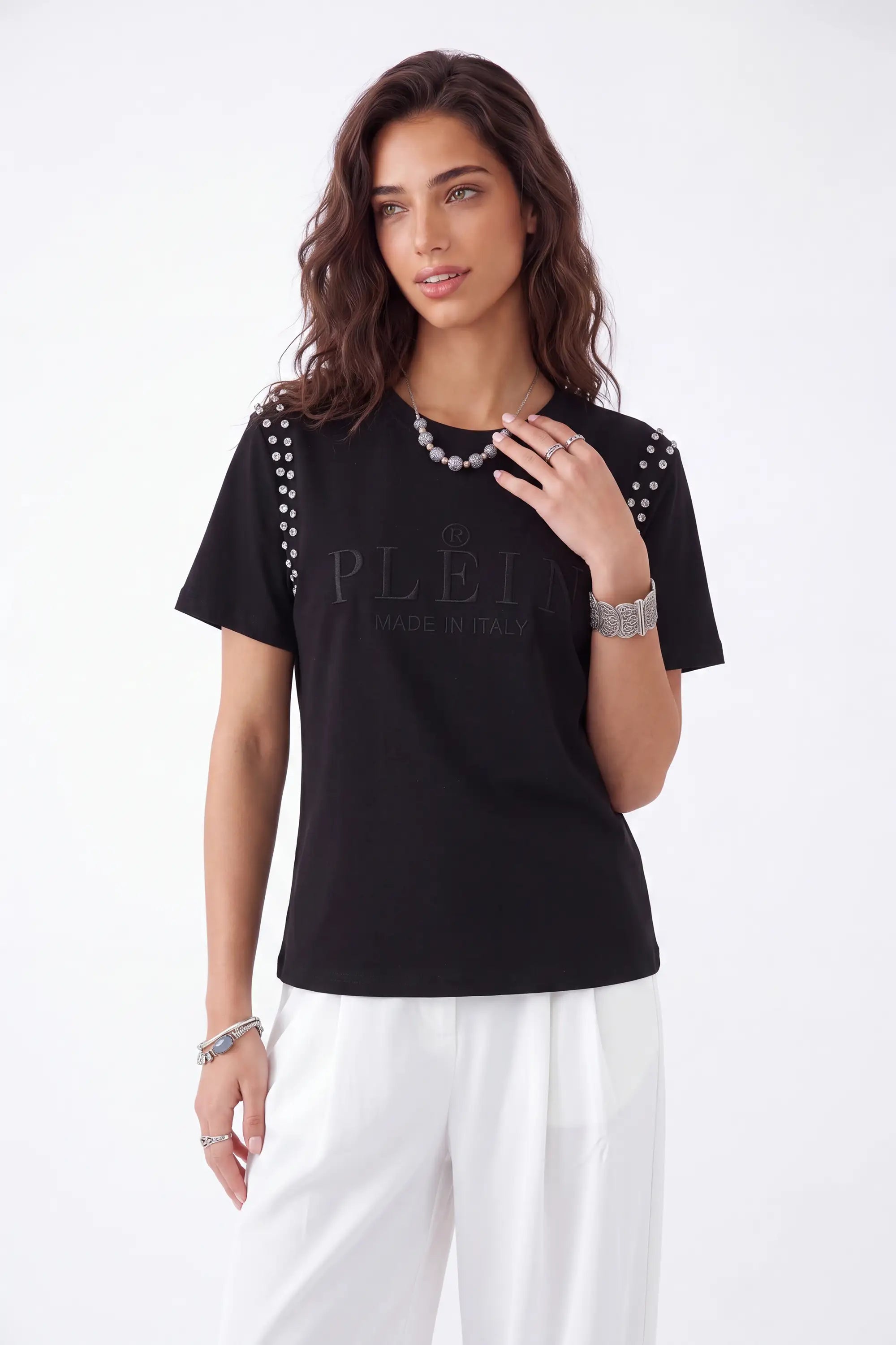 Black Crew Neck T-Shirt with Studded Shoulders and PLEIN Embroidery on model, studio view 2 – Elppis JD3E5410AV