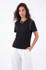 Black Crew Neck T-Shirt with Studded Shoulders and PLEIN Embroidery on model, studio view 3 – Elppis JD3E5410AV
