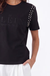 Black Crew Neck T-Shirt with Studded Shoulders and PLEIN Embroidery on model, studio view 4 – Elppis JD3E5410AV