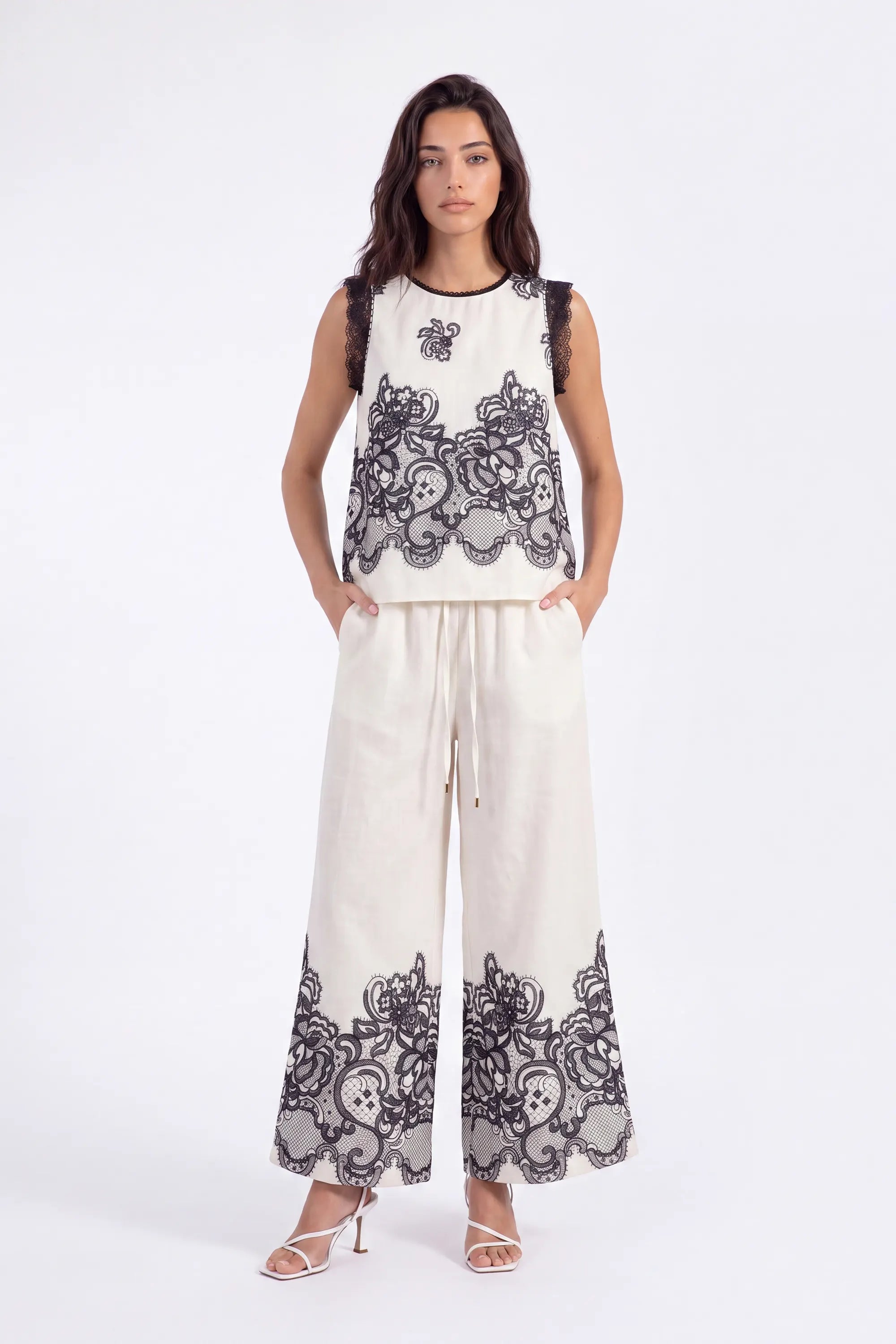 Ivory Wide-Leg Pants with Black Lace Floral Border Print on model, studio view 4 – Elppis JD4I7642BO