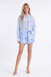 Light Blue Floral Print Long-Sleeve Shirt with Pearl Button Embellishments — model front view 1