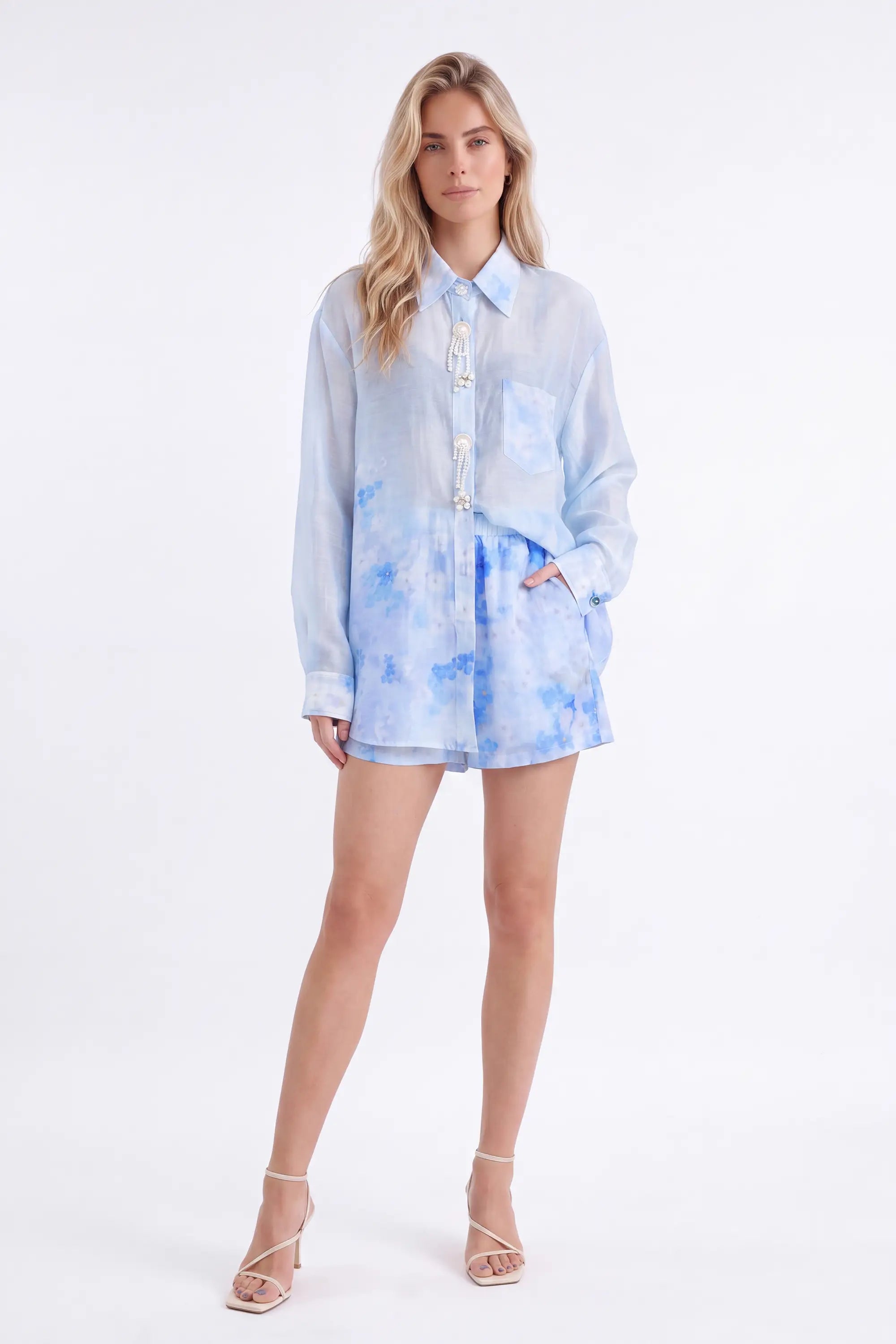 Light Blue Floral Print Long-Sleeve Shirt with Pearl Button Embellishments — model front view 1