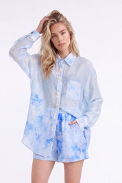 Light Blue Floral Print Long-Sleeve Shirt with Pearl Button Embellishments — model front view 2