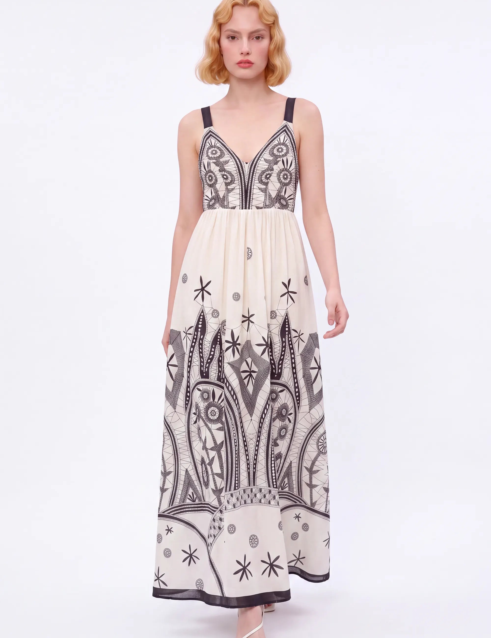 Off-White Sleeveless Maxi Dress with Black Ethnic Embroidery — Model White Background Front