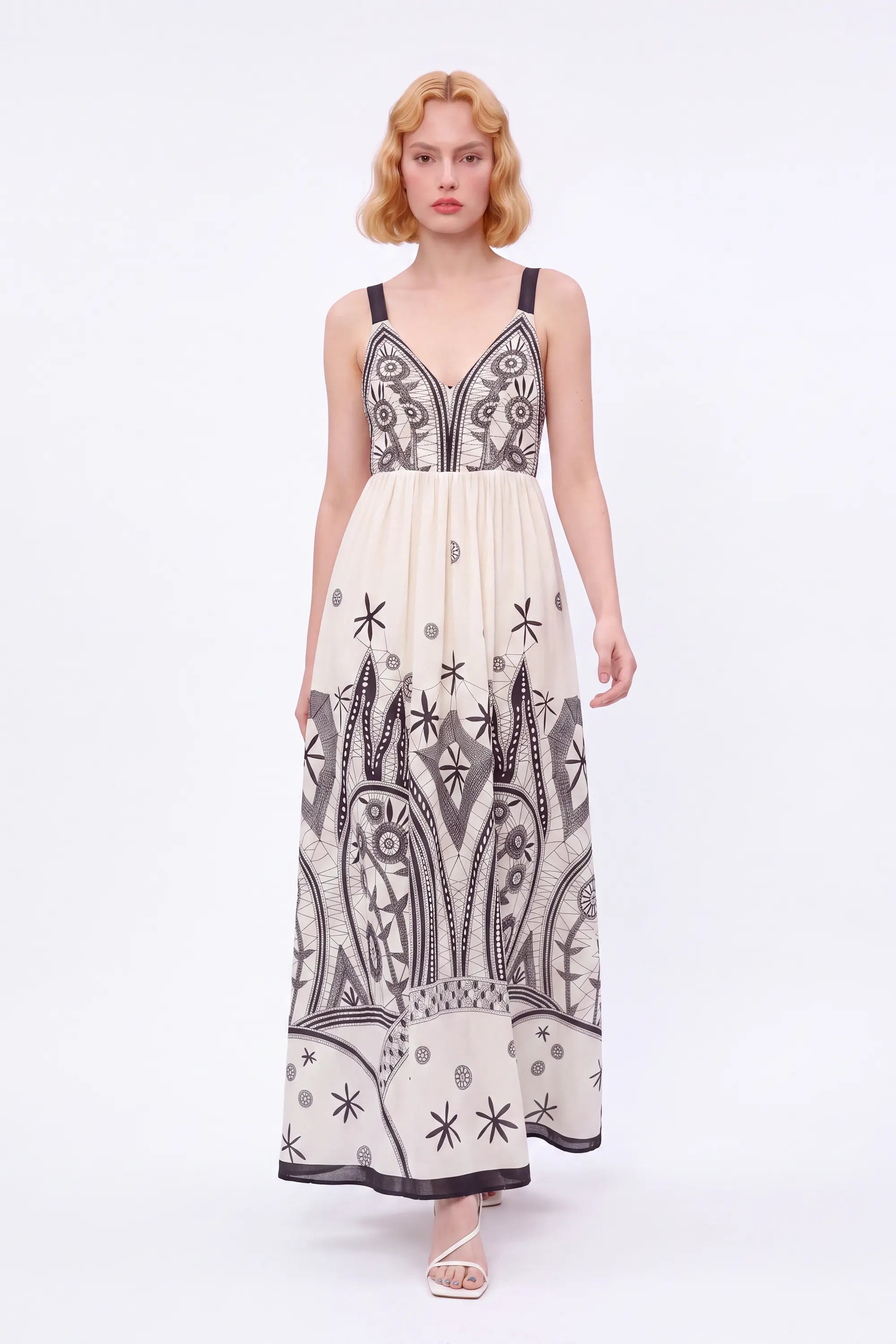 Off-White Sleeveless Maxi Dress with Black Ethnic Embroidery — Model White Background Front