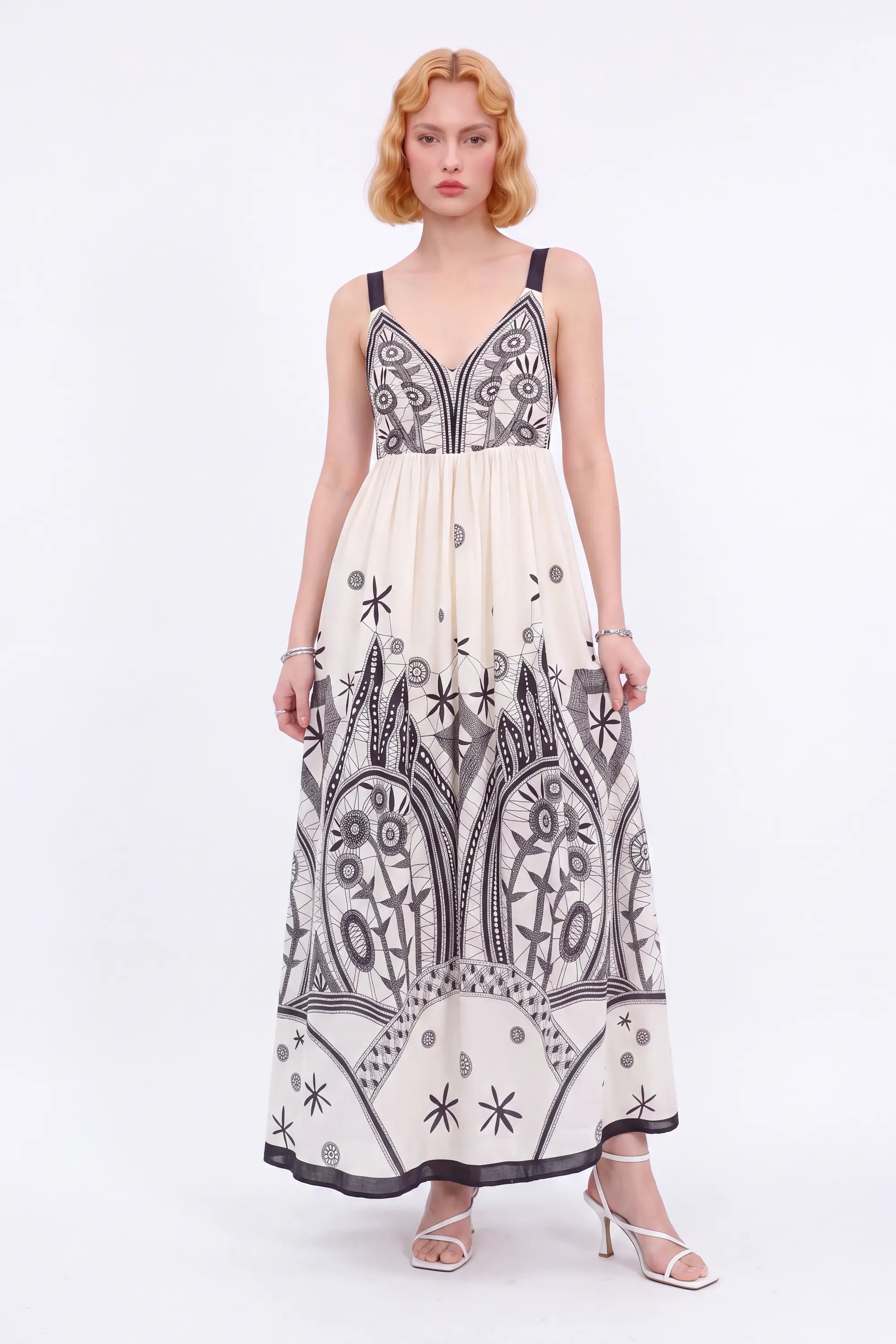 Off-White Sleeveless Maxi Dress with Black Ethnic Embroidery — Model White Background View 4