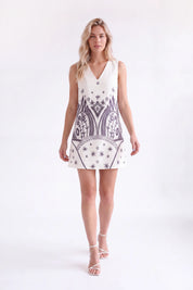 Off-White Sleeveless Shift Dress with Black Ethnic Pattern — Model White Background Front