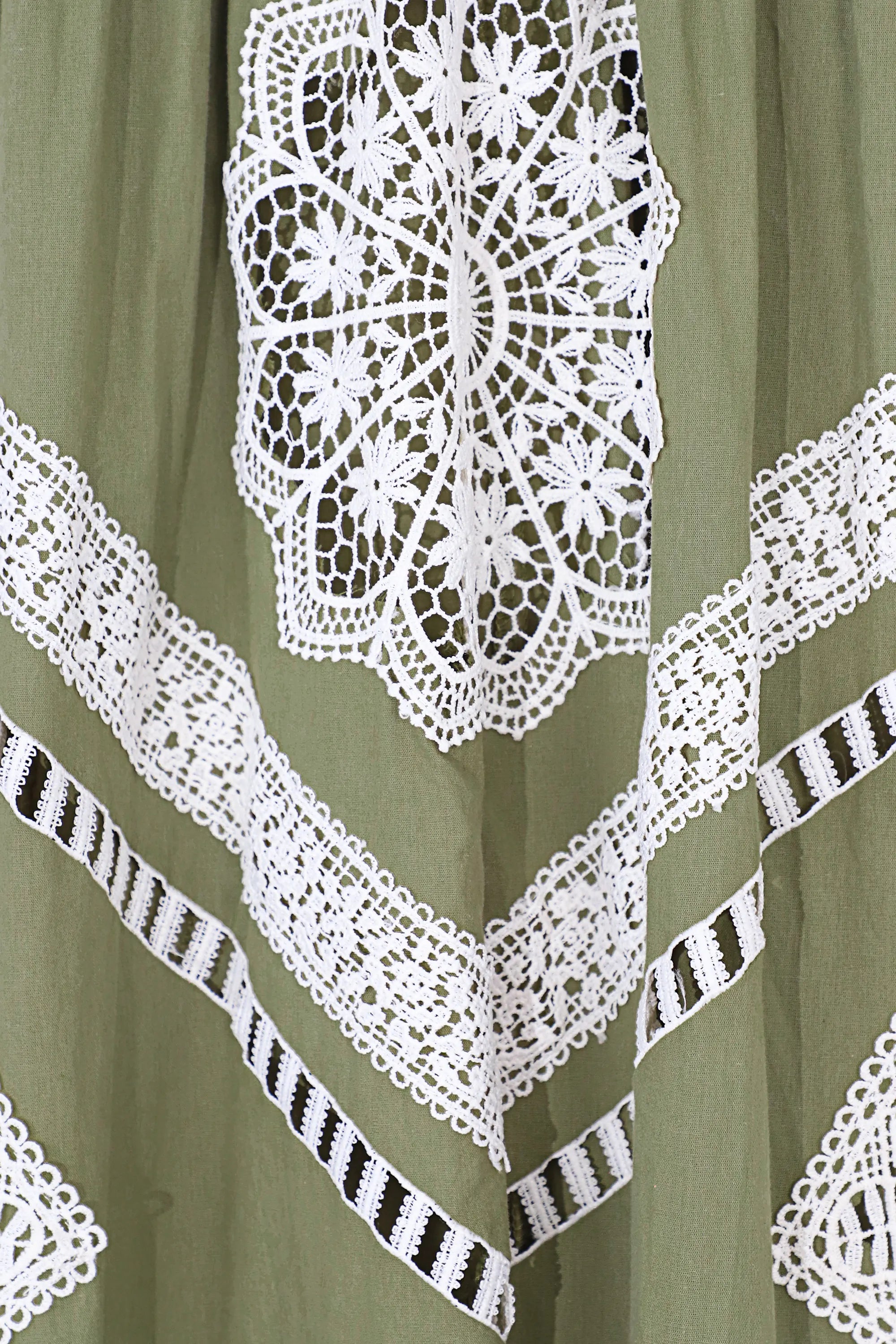 White crochet lace appliqué detail on olive green Elppis maxi dress