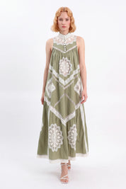 Olive green crochet lace sleeveless maxi dress by Elppis, model front view on white background