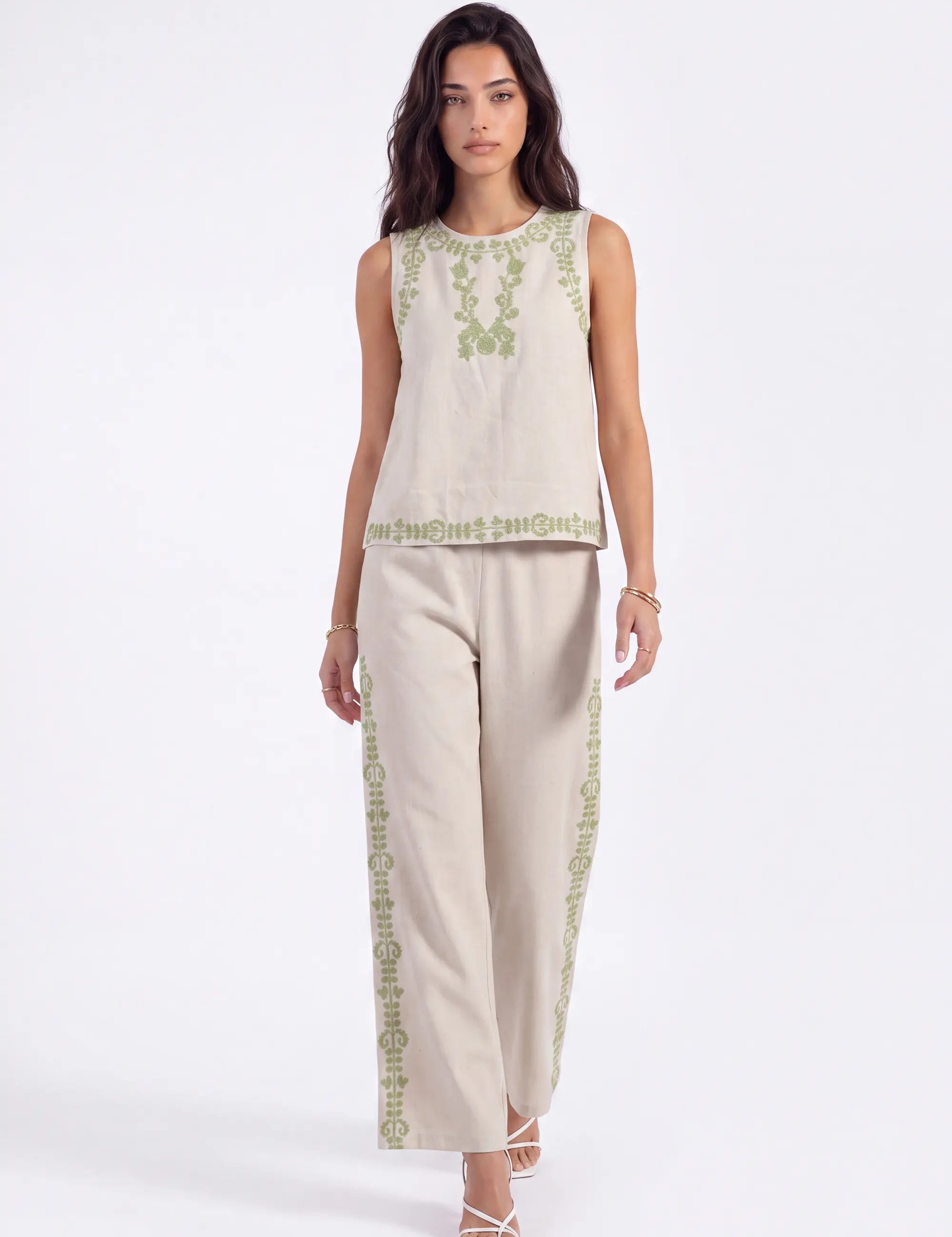 Beige Sleeveless Top with Green Embroidery on model, front view – Elppis UV3D9796F