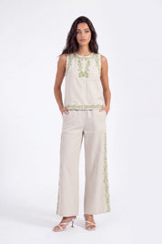 Beige Sleeveless Top with Green Embroidery on model, studio view 4 – Elppis UV3D9796F