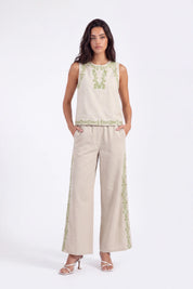 Beige Wide-Leg Pants with Green Side Embroidery on model, studio view 2 – Elppis UV3I9797F
