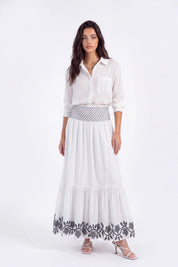 White Maxi Skirt with Black Geometric and Floral Embroidery on model, studio view 3 – Elppis UV3J9324F-1-F