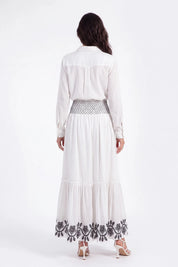 White Maxi Skirt with Black Geometric and Floral Embroidery on model, studio view 4 – Elppis UV3J9324F-1-F
