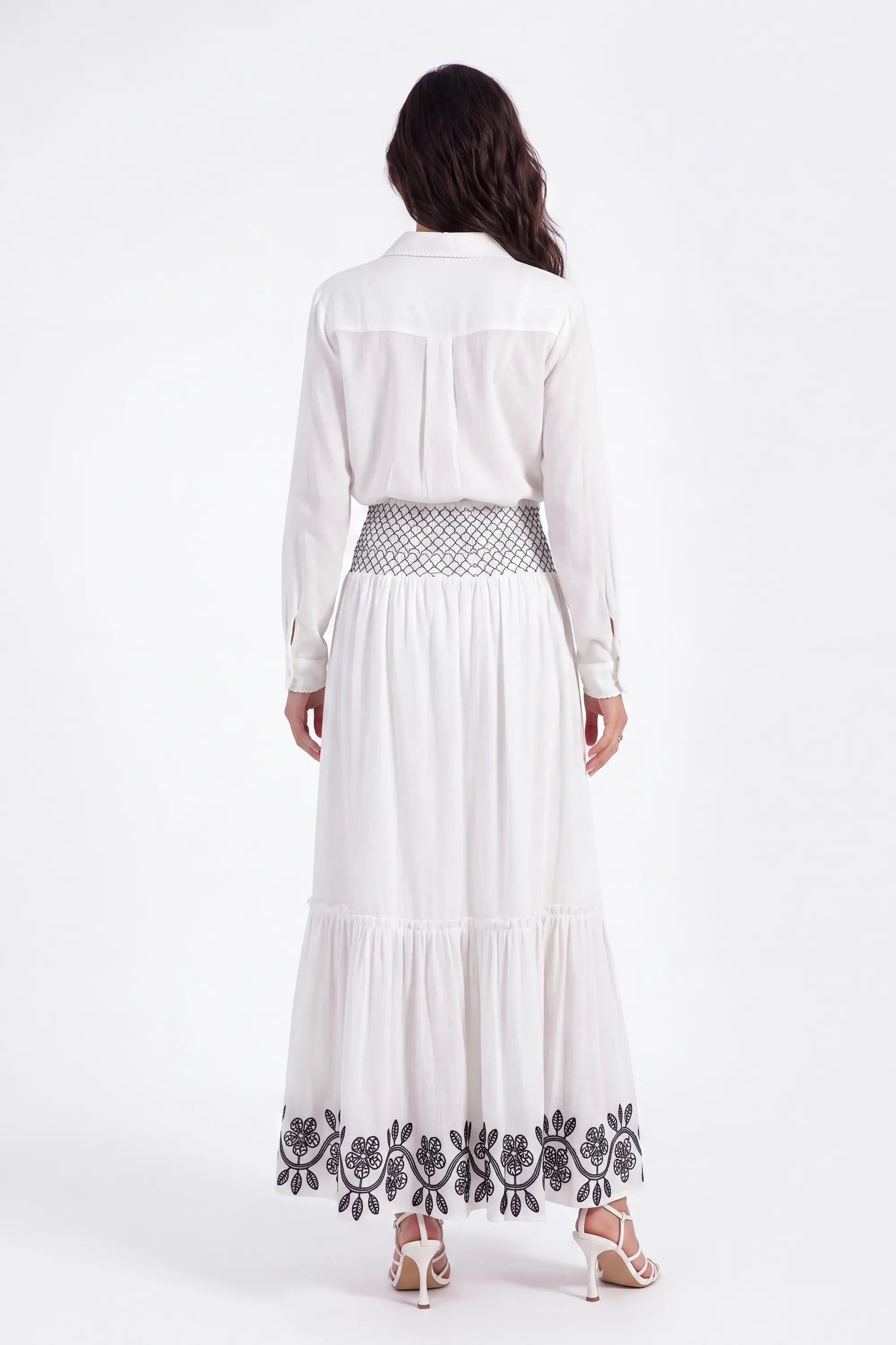 White Maxi Skirt with Black Geometric and Floral Embroidery on model, studio view 4 – Elppis UV3J9324F-1-F