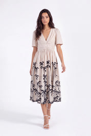 Beige Linen-Blend Midi Dress with Black Palm Tree Print on model, studio view 5 – Elppis UV3K9494F-2-F-01BS