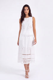 White Linen Midi Skirt with Palm Tree Eyelet and Lace Detail on model, studio view 2 – Elppis UV4J9811F