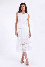 White Linen Midi Skirt with Palm Tree Eyelet and Lace Detail on model, studio view 4 – Elppis UV4J9811F