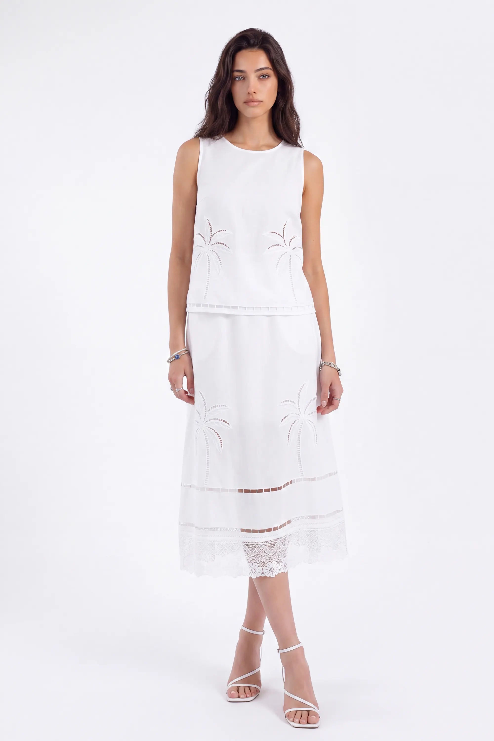 White Linen Midi Skirt with Palm Tree Eyelet and Lace Detail on model, studio view 4 – Elppis UV4J9811F